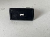 Bouton interrupteur ouverture du coffre