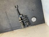Front shock absorber with coil spring
