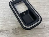 Front door interior handle trim
