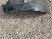Front wheel arch liner splash guards