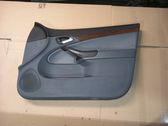 Front door card panel trim