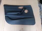 Front door card panel trim