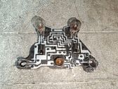 Tail light bulb cover holder