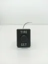 Bouton interrupteur de pression des pneus