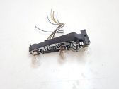 Tail light bulb cover holder