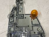 Tail light bulb cover holder