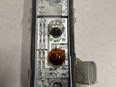 Tail light bulb cover holder