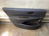 Front door card panel trim