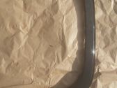 Garniture pour voûte de roue avant