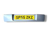 Trunk door license plate light bar