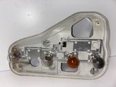 Tail light bulb cover holder