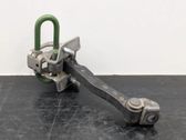 Front door check strap stopper
