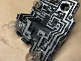 Tail light bulb cover holder