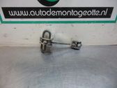 Takaoven lukon laukaisin