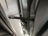 Rear door check strap stopper