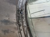 Front wiper blade arm