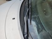 Front wiper blade arm