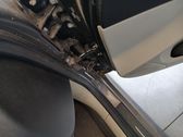 Front door check strap stopper