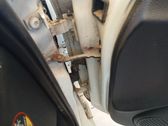 Front door check strap stopper