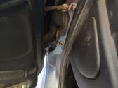 Front door check strap stopper