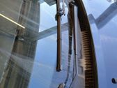 Front wiper blade arm