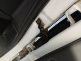 Front door check strap stopper