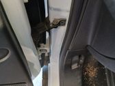 Front door check strap stopper