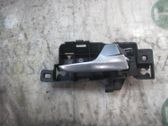 Manecilla interna puerta delantera
