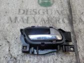 Manecilla interna puerta delantera