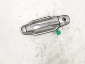 Manecilla externa puerta delantera