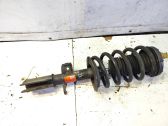 Front shock absorber with coil spring