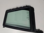 Ventanilla de ventilación de la puerta trasera