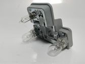 Tail light bulb cover holder