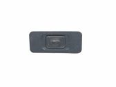 Interruptor para abrir la puerta trasera