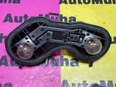 Tail light bulb cover holder