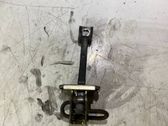 Front door check strap stopper