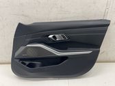 Front door card panel trim