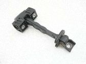 Front door check strap stopper