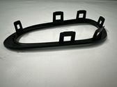 Rear door handle trim