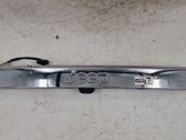 Trunk door license plate light bar