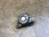 Alternator belt tensioner