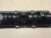 Cache culbuteur