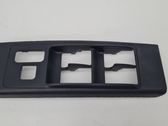 Front door window switch trim
