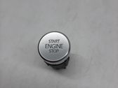 Bouton poussoir de démarrage du moteur