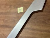 Front door trim bar