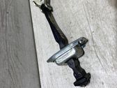 Front door check strap stopper