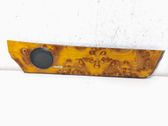 Front door trim bar