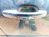 Manecilla externa puerta delantera