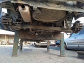 Rear axle beam with reductor