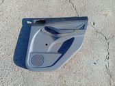 Moldura del tarjetero de la puerta trasera